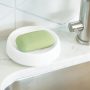 Soap saver flow plus wit rond impressie naast kraan